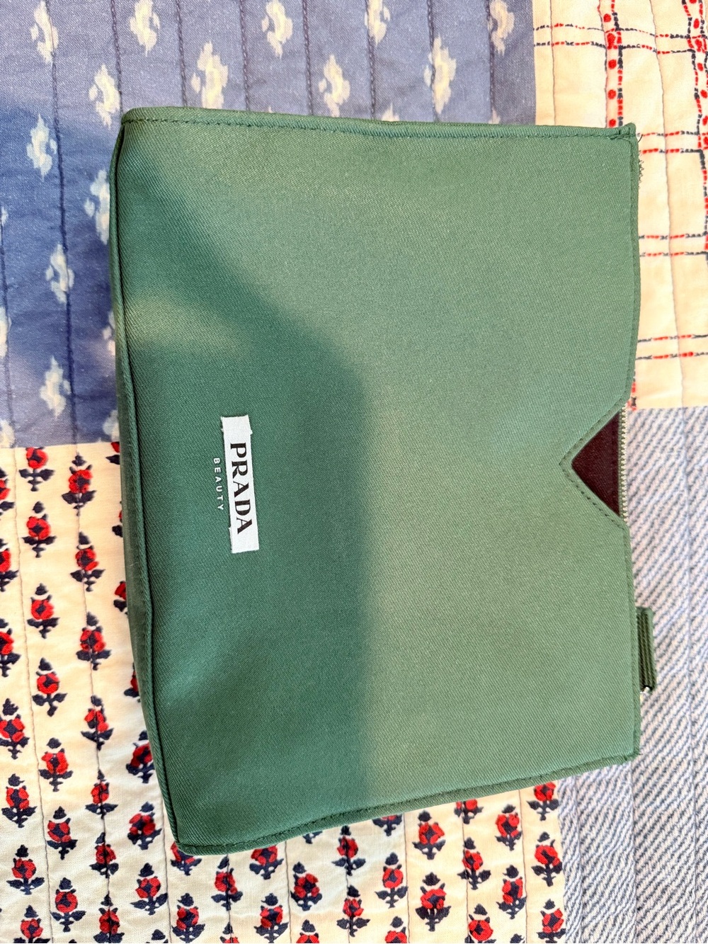 Prada green nylon cosmetic pouch with tucked flap
